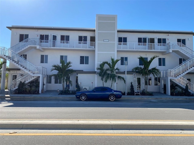 10250 NW 66th St Unit 103, Doral, FL 33178 - view of building exterior with stairs