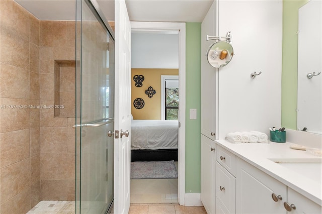 8956 Palm Tree Ln Unit 8956, Pembroke Pines, FL 33024 - ensuite bathroom featuring vanity, tile patterned floors, ensuite bathroom, and a stall shower