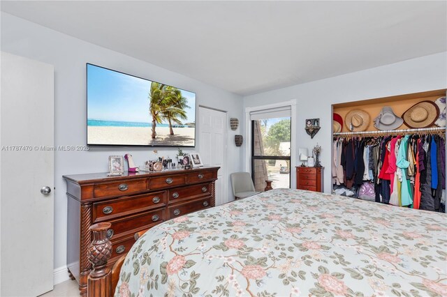 8956 Palm Tree Ln Unit 8956, Pembroke Pines, FL 33024 - bedroom featuring a closet and baseboards