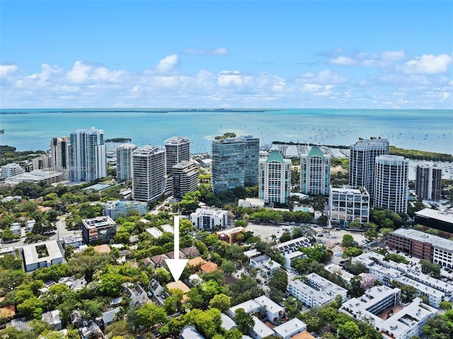 aerial view featuring a water view and a view of city