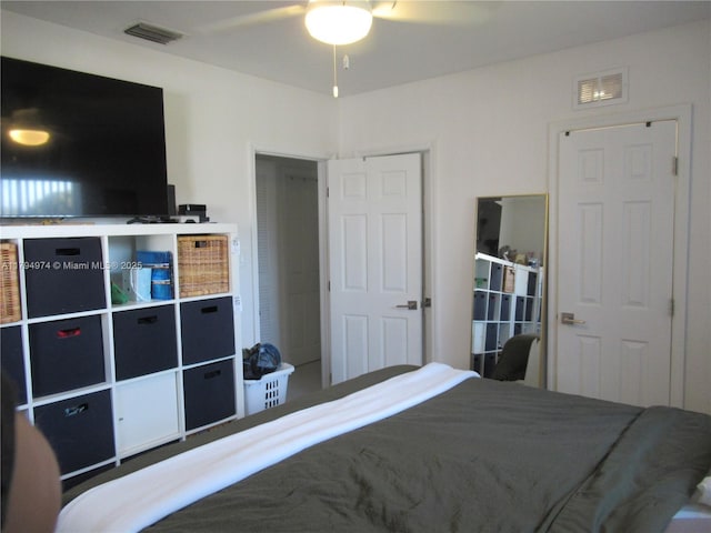bedroom with visible vents and ceiling fan