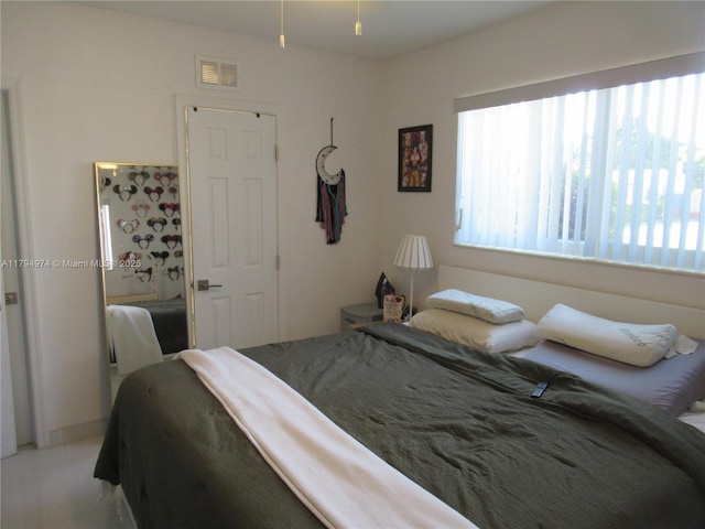 bedroom with visible vents