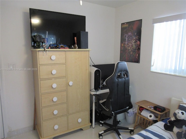 bedroom featuring multiple windows