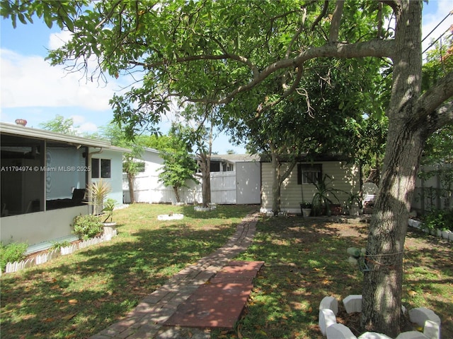 view of yard featuring fence