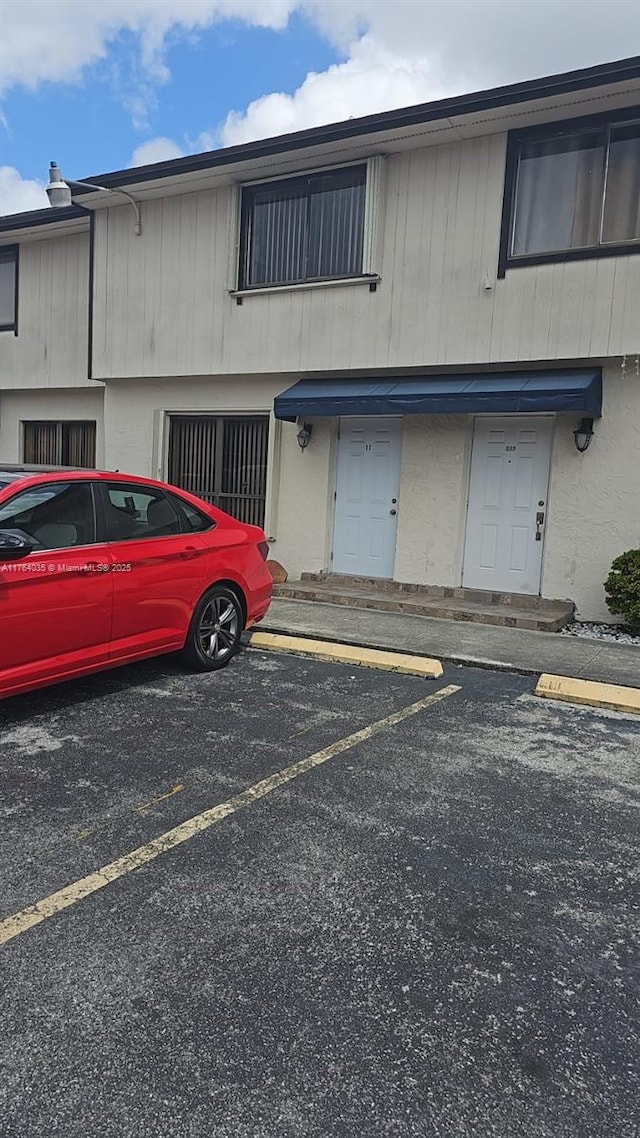 exterior space with uncovered parking