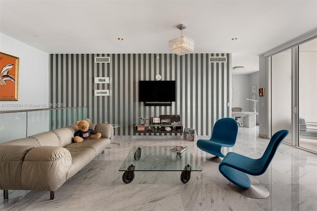 living room featuring wallpapered walls and marble finish floor
