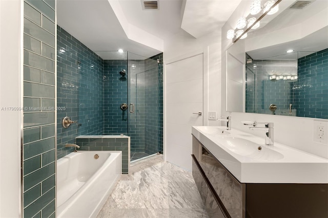 full bath featuring a sink, a stall shower, a garden tub, and visible vents