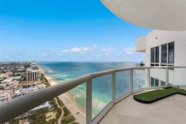 balcony featuring a water view