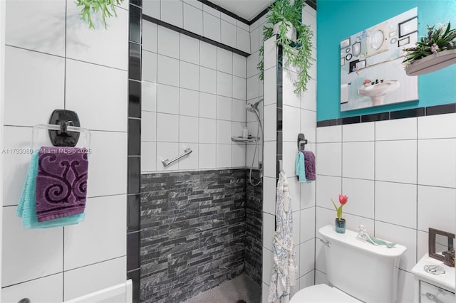 full bath with walk in shower, toilet, and tile walls