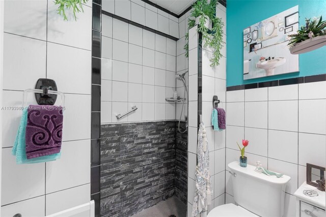 741 E Coco Plum Cir Unit 8, Plantation, FL 33324 - full bath featuring tile walls, toilet, and a stall shower