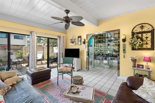 741 E Coco Plum Cir Unit 8, Plantation, FL 33324 - tiled living room featuring a ceiling fan, baseboards, and wooden ceiling with exposed beams