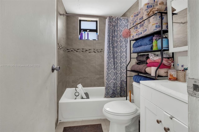 bathroom with toilet, tile patterned floors, shower / bath combo, and vanity