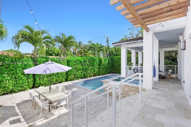 view of swimming pool featuring a patio, outdoor dining area, and a fenced in pool