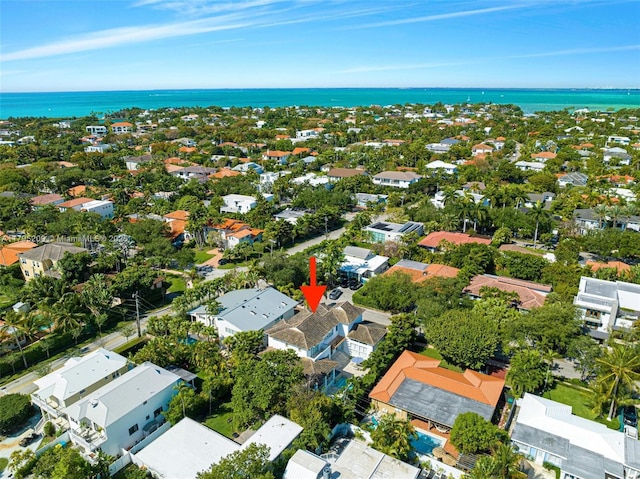 bird's eye view with a water view and a residential view