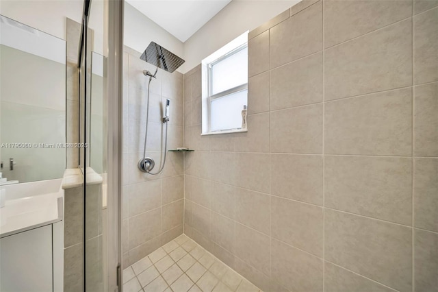 bathroom with vanity and a stall shower