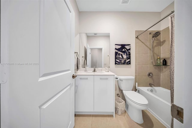 bathroom featuring vanity, shower / bathing tub combination, tile patterned flooring, and toilet