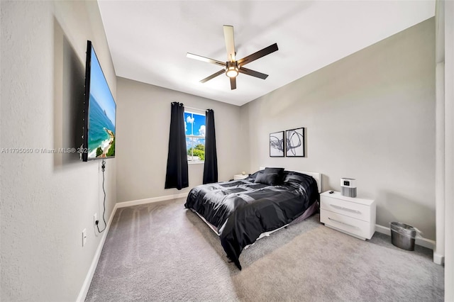 bedroom featuring carpet floors, baseboards, and a ceiling fan