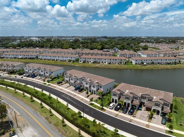 aerial view with a residential view and a water view