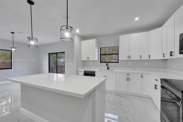 7806 NW 68th Ave, Tamarac, FL 33321 - kitchen featuring visible vents, marble finish floor, black electric range oven, a center island, and a sink