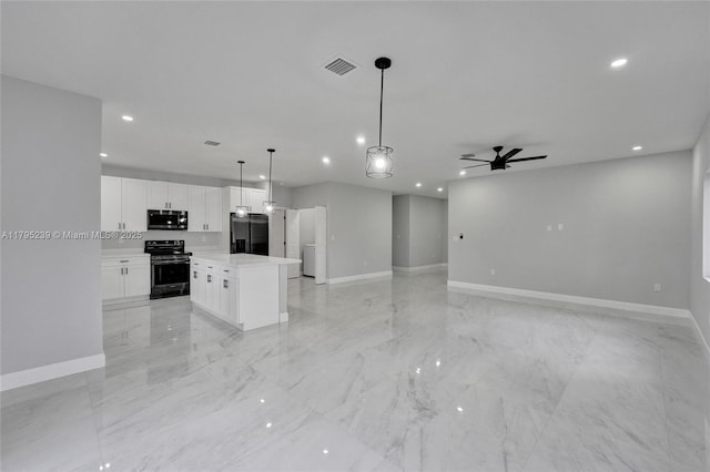 7806 NW 68th Ave, Tamarac, FL 33321 - kitchen featuring visible vents, recessed lighting, appliances with stainless steel finishes, and a center island