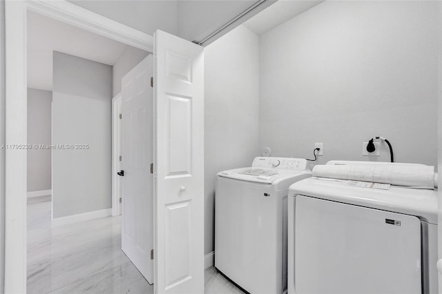 7806 NW 68th Ave, Tamarac, FL 33321 - washroom with baseboards, laundry area, marble finish floor, and washer and dryer