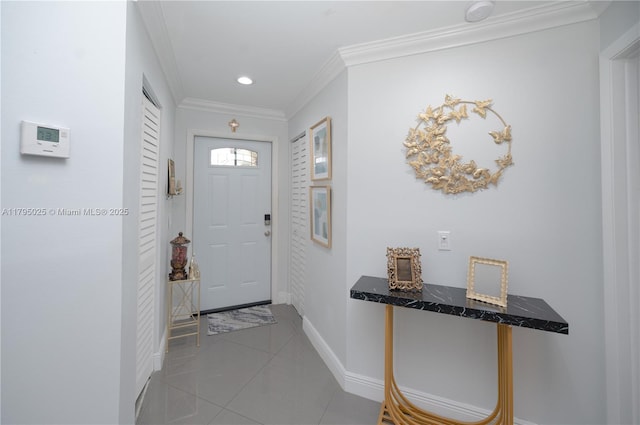 entryway featuring crown molding, recessed lighting, baseboards, and light tile patterned floors