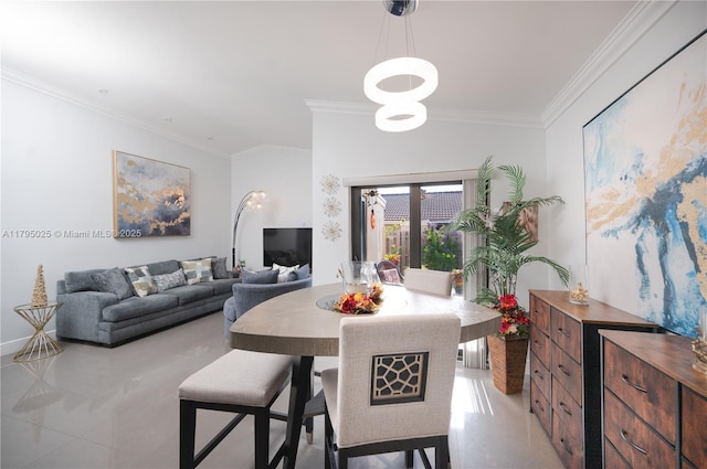 dining room featuring an inviting chandelier, ornamental molding, and light tile patterned flooring