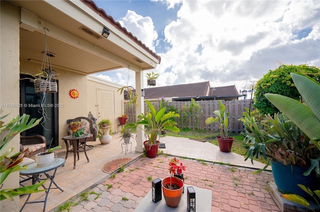 view of patio / terrace with fence