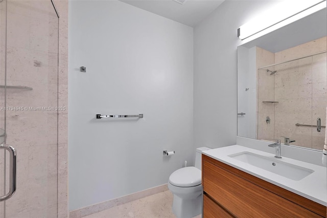 full bath featuring baseboards, a stall shower, toilet, and vanity
