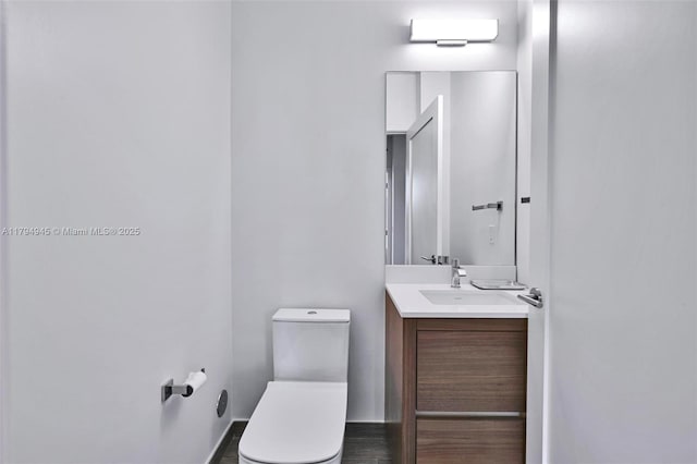 3581 E Glencoe St Unit 207, Miami, FL 33133 - bathroom with toilet and vanity