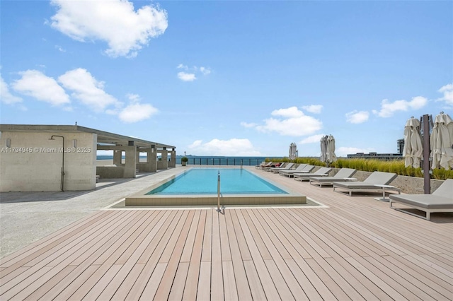 community pool featuring a deck