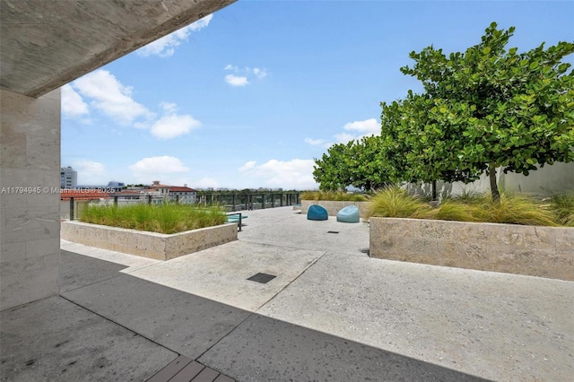 view of home's community featuring a patio area