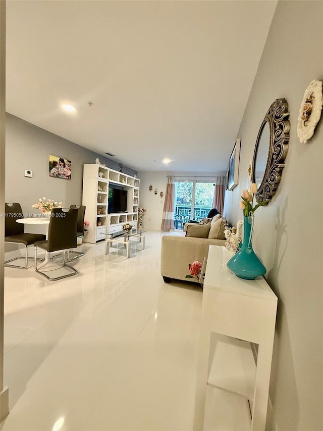 living area with recessed lighting