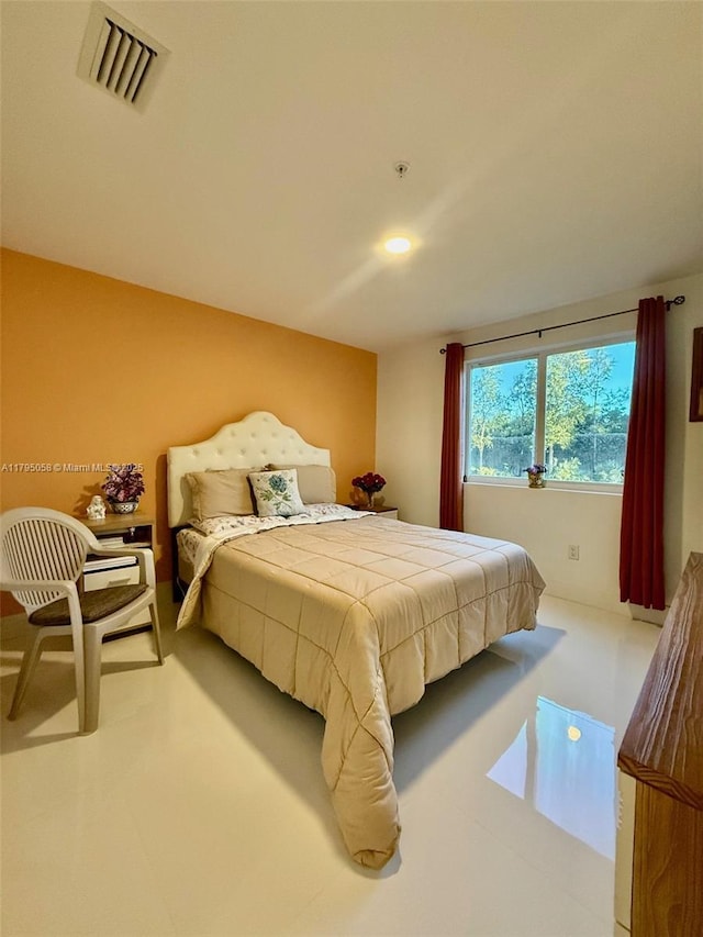bedroom featuring recessed lighting and visible vents