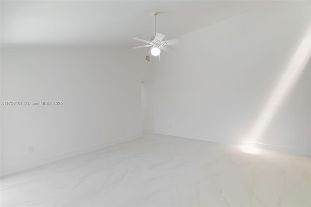 5926 Golden Eagle Cir, Palm Beach Gardens, FL 33418 - empty room with ceiling fan, light marble finish flooring, and baseboards