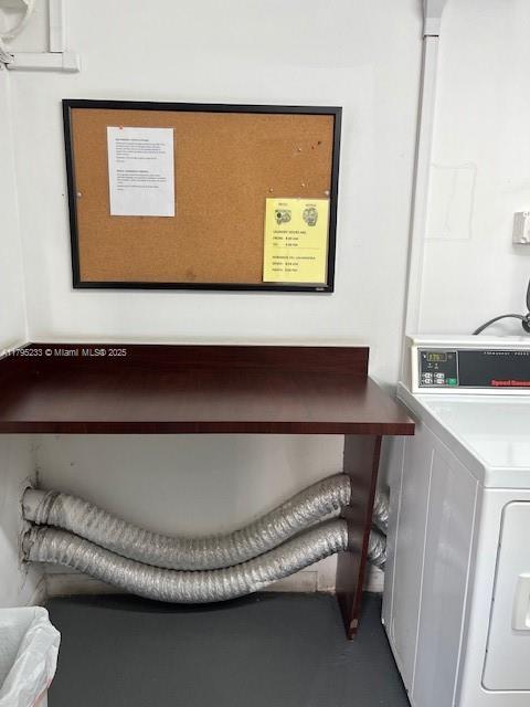 interior space with washer / clothes dryer