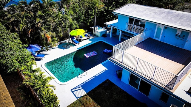 outdoor pool with a patio