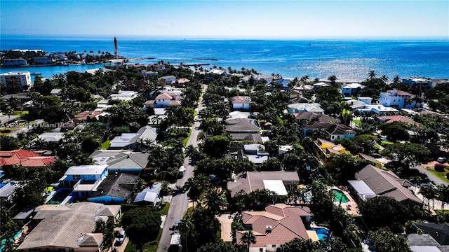 aerial perspective of suburban area featuring a large body of water
