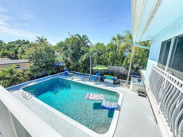 view of pool featuring a fenced backyard and a patio