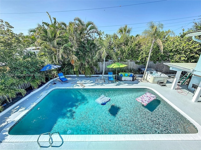 view of pool with a patio area and a fenced backyard