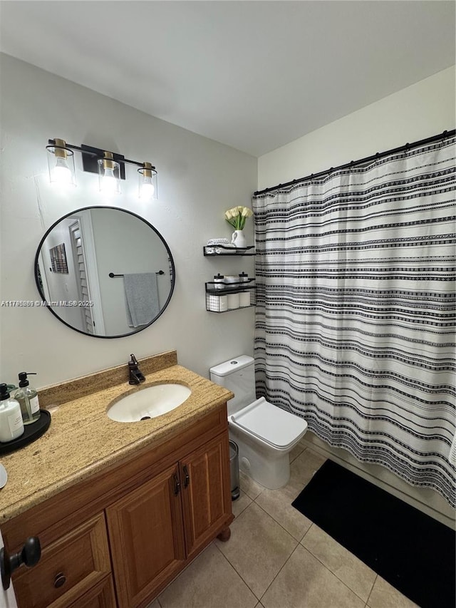 2500 SW 137th Ct, Miami, FL 33175 - bathroom with toilet, vanity, and tile patterned flooring