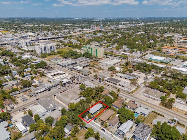 birds eye view of property featuring a view of city