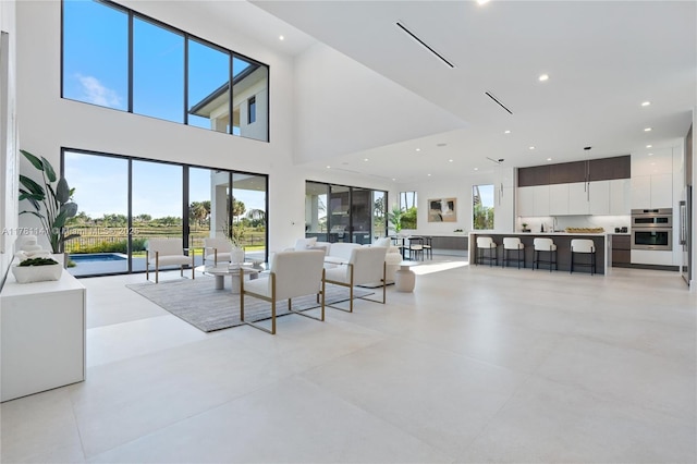 12060 NW 67th Ct, Parkland, FL 33076 - view of swimming pool with a patio area, a pool with connected hot tub, and fence