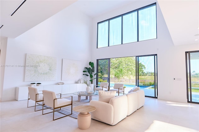 12060 NW 67th Ct, Parkland, FL 33076 - kitchen featuring a sink, open floor plan, modern cabinets, a towering ceiling, and dishwasher