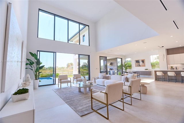 12060 NW 67th Ct, Parkland, FL 33076 - living area featuring a towering ceiling