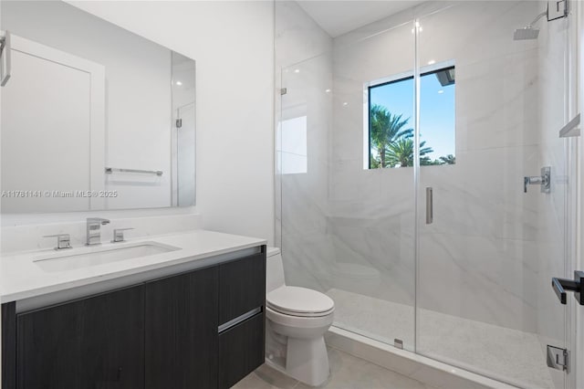 12060 NW 67th Ct, Parkland, FL 33076 - full bathroom featuring vanity, toilet, a marble finish shower, and tile patterned floors