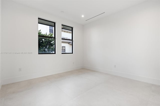 12060 NW 67th Ct, Parkland, FL 33076 - unfurnished room with baseboards and recessed lighting