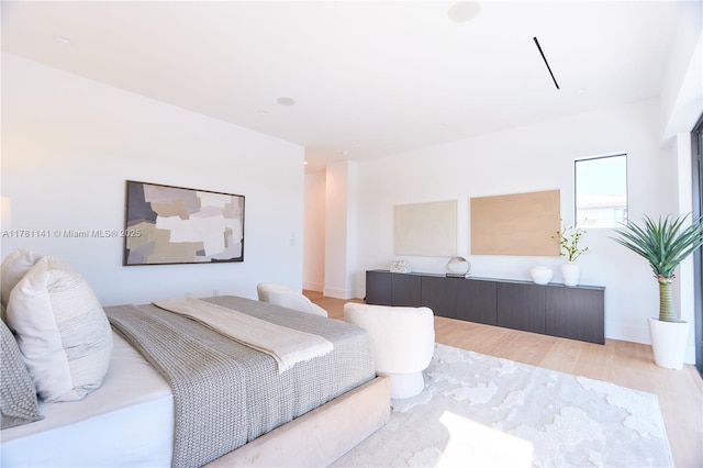 12060 NW 67th Ct, Parkland, FL 33076 - bedroom with light wood-style flooring