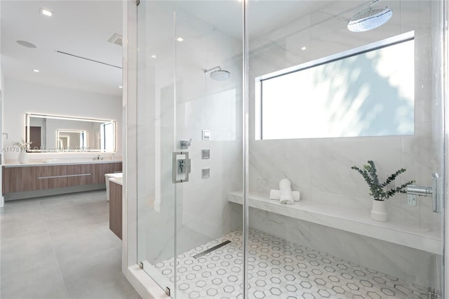 12060 NW 67th Ct, Parkland, FL 33076 - bathroom featuring a stall shower, vanity, and tile patterned floors
