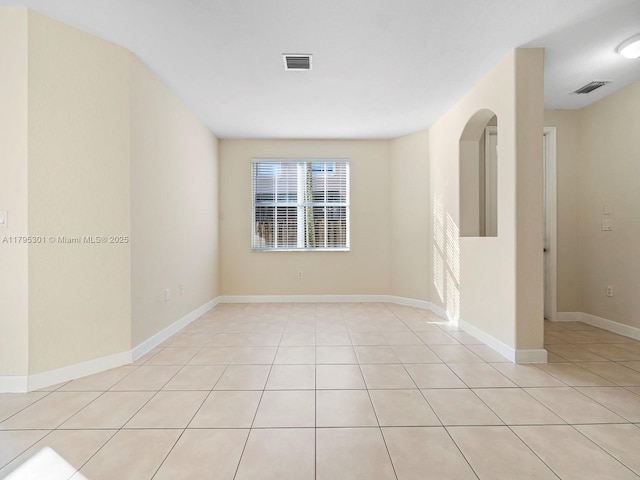 1416 SE 26th Ave, Homestead, FL 33035 - empty room featuring baseboards, visible vents, and light tile patterned floors